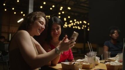 Best Friends Women Discussing Pictures In Social Media, Looking At Smartphone, Gossiping Girls