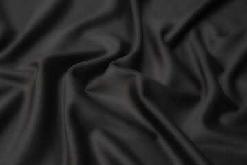 Close-up texture of natural gray or black fabric or cloth in same color. Fabric texture of natural...