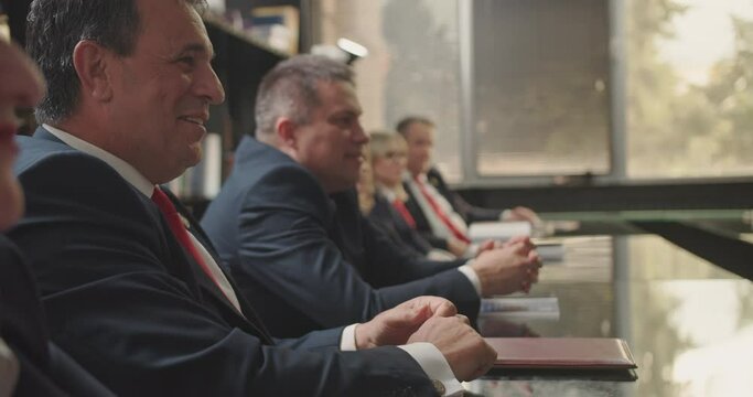 Experienced Business Leaders Discussing New Projects for Profit Growth in a Modern Office Conference Room