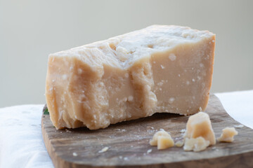 Traditional italian food - 36 months aged in caves Italian parmesan hard cheese from Parmigiano-Reggiano, Italy