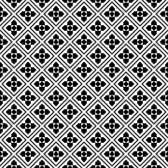 Repeated black figures on white background. Ethnic wallpaper. Seamless surface pattern design with floral ornament. Rhombuses and pentagons motif. Digital paper for textile print, web designing.