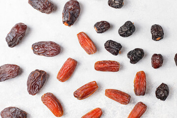 Fresh organic and various sweet dried date fruits.