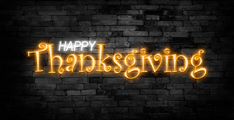 Happy thanksgiving day neon sign. Greeting card on brick wall background.