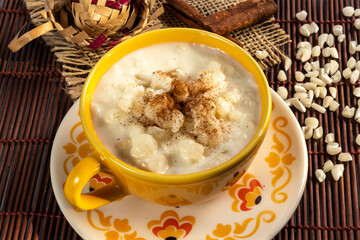 cup of canjica, typical food consumed in the Brazilian Festa Juninas