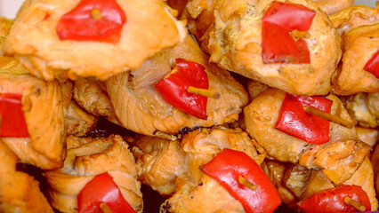 Close-up of grilled salmon and vegetable kebab. Grilled salmon skewers at the Home Makers Market
