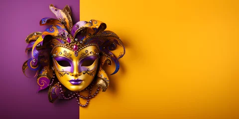 Rollo Colorful traditional venetian or mardi gras carnival mask with decoration for national festival celebration on purple - yellow background with copy space. © AnaWein
