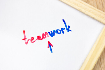 TEAMWORK text, word written with a marker. Teamwork concept.