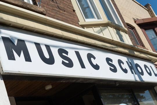 exterior sign of MJMS - the music school located at 2176 Dundas Street West, Toronto, Ontario