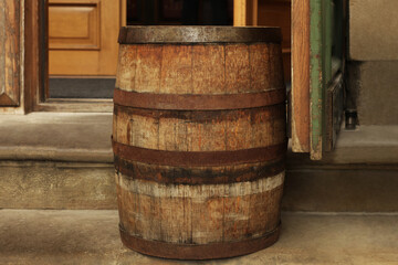 Traditional wooden barrel on street outdoors. Wine making