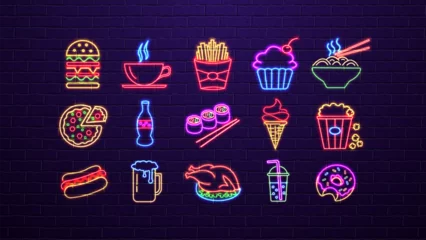 Foto op Aluminium A set of neon glowing bright icons of fast food for a restaurant, cafe, bar and snack bars on a brick wall background in the colors blue, green, yellow and red. © Dmytro