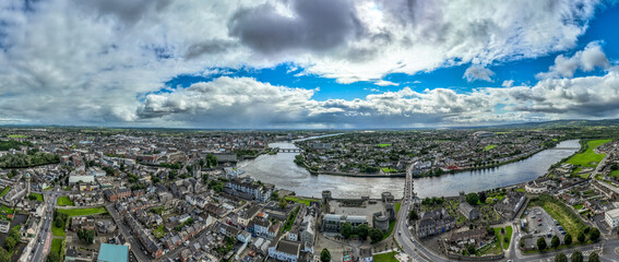 Aerial view of Limerick city on the banks of the Shannon river with the Thomond bridge, King John's...