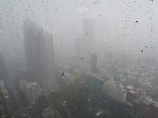 Rain Droplets on the window see Tokyo city view.