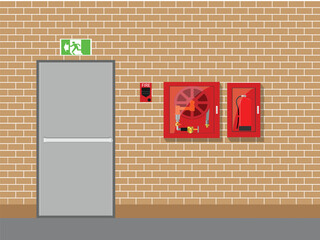 Fire exit with fire extinguisher and red alarm on brick wall background