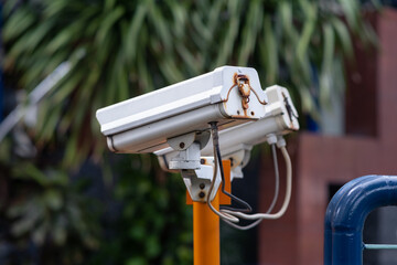 cctv security camera om orange pole