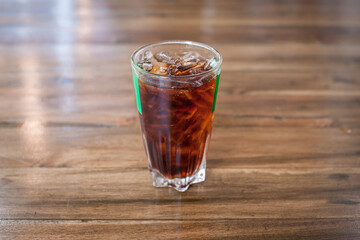 glass of cola with ice