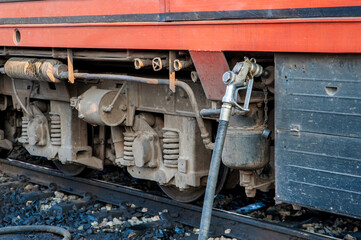 The train is refueling at the station.