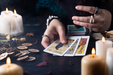 Fortune-telling on tarot cards, the hands of a fortune-teller