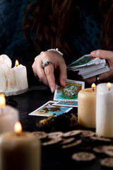 Fortune-telling on tarot cards, the hands of a fortune-teller