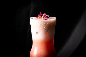 cocktail - infused vodka with strawberry , infused sweet Vermont with chocolate, white egg, syrup, lime juice, topping with magic pop