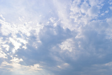 beautiful blue sky and cloud with golden ray sunrise in the morning, natural background
