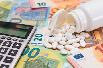 Ordering Medicines. Expensive Medicine and Inflation Concept: Pills and Capsules on the Euro Banknotes. Global Pharmaceutical Industry and Big Pharma. Trade in Medicines