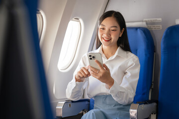 Texting on mobile chat app, Thoughtful asian people female person onboard, airplane window,...
