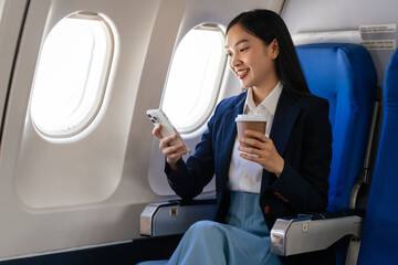 Young asian chinese japanese people female adventurer in-flight, mapping out destinations as she voyages worldwide. woman passenger of airplane. travel around the world.