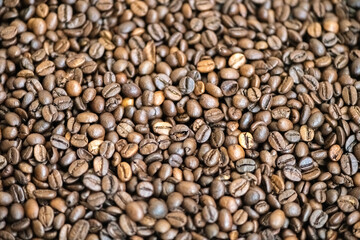 Freshly roasted delicious coffee beans close-up.