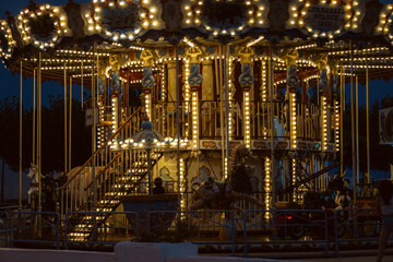 Obraz premium carousel in the park