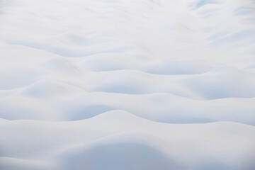 Snow texture, snow-covered field with uneven surface