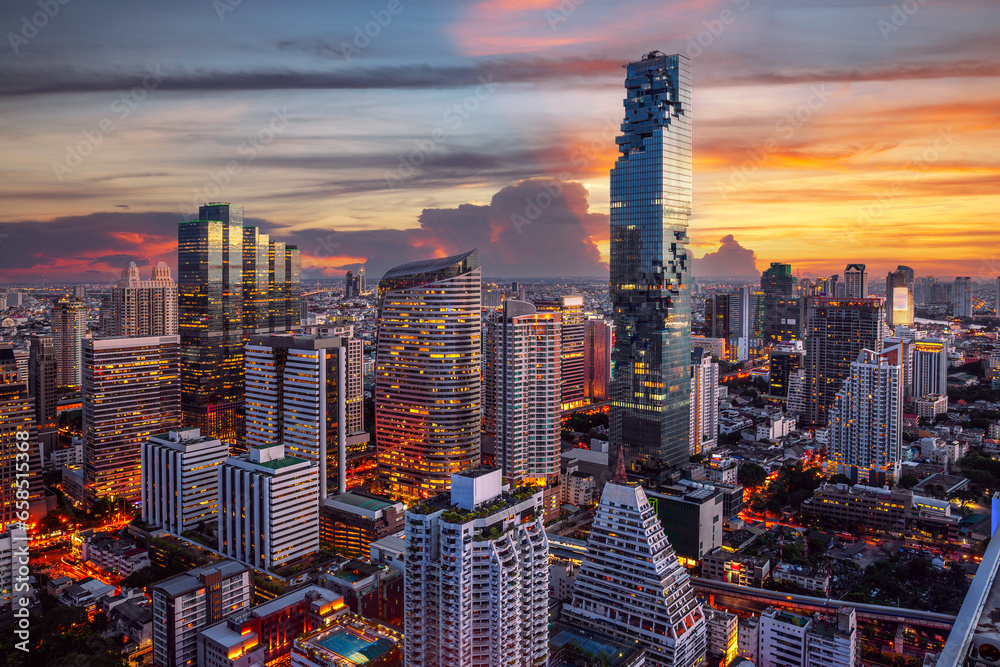 Sticker highest Building in bangkok city with sunset sky in silom district area