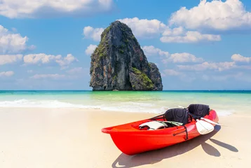 Foto auf Acrylglas Railay Strand, Krabi, Thailand Kayak boat on the beach with poda island background and blue sky