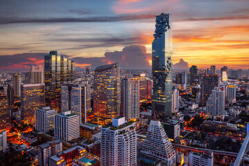 highest Building in bangkok city with sunset sky in silom district area - obrazy, fototapety, plakaty
