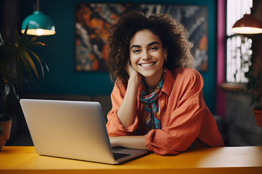 Beautiful Young Woman Working Laptop, Student Or Freelancer Sitting At Cafe Table, Looking Into Camera.generated By AI Model