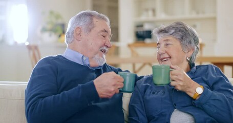 Happy, coffee and senior couple in conversation in the living room of modern home together. Smile, cheers and elderly man and woman in retirement talking, relaxing and drinking latte in the lounge. - Powered by Adobe
