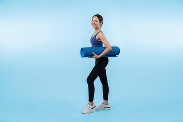 Fototapeta na wymiar Young attractive asian woman portrait in sportswear with exercising mat. Healthy exercise and workout routine lifestyle concept. Studio shot isolated background. Vigorous