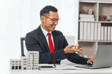 Agent presents contracts for property purchase or lease. Businessman asian indian people showcases...