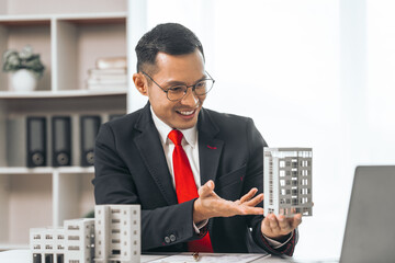 Agent presents contracts for property purchase or lease. Businessman asian indian people showcases...