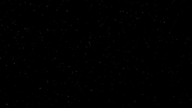 dust particles flying over a black background