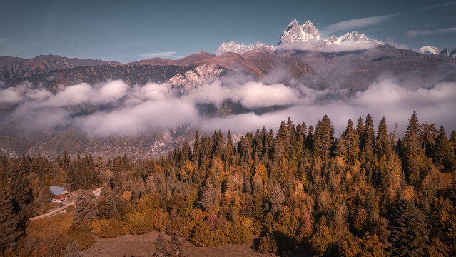 Autumn colors of Svaneti on mount Ushba background