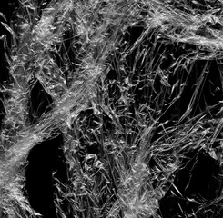 Wrinkled plastic wrap texture on a black background wallpaper. Royalty high-quality free stock photo image of realistic plastic wrap for overlay, copy space and photo effect. Wrinkled plastic surface