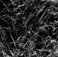 Wrinkled plastic wrap texture on a black background wallpaper. Royalty high-quality free stock...