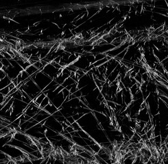 Wrinkled plastic wrap texture on a black background wallpaper. Royalty high-quality free stock photo image of realistic plastic wrap for overlay, copy space and photo effect. Wrinkled plastic surface