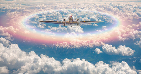 Old metallic propeller airplane in the sky with rounded rainbow