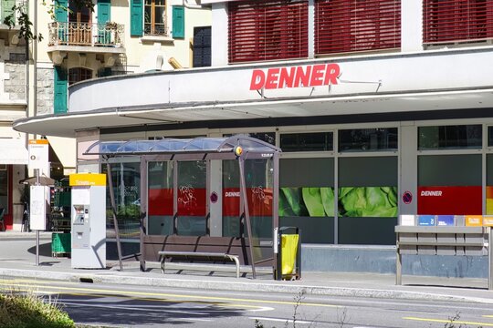 geneva, switzerland - 08 September 2022: the sign with logo of the swiss discount supermarket denner above the entrance of a city location