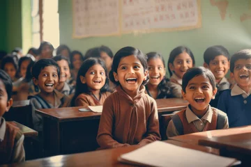 Fotobehang Indian little girls sitting in classroom at school. © Neha
