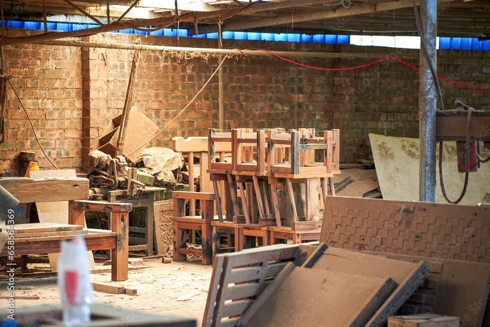 Wall mural a busy and messy furniture processing factory