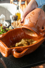 Delicious traditional Moroccan Tanjia dish, served with Moroccan tea ,salad and bread