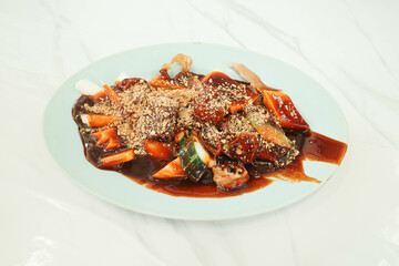 Close up of a traditional fruit and vegetable salad dish tossed with a special prawn paste or also known locally as 