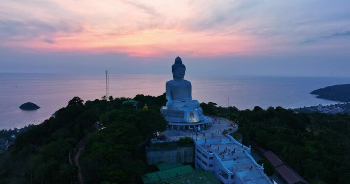 ..Amazing sweet sky in sunset at Phuket big Buddha. .The beauty of the statue fits perfectly with the charming nature..amazing pink sky in sweety sunset at Phuket big Buddha.